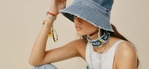 an image showcasing how to accessorize denim with items like a denim bucket hat or choker, with a caption providing accessory tips.